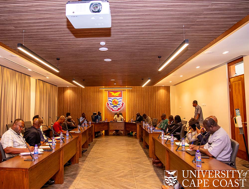 Council Chairman in a meeting with management