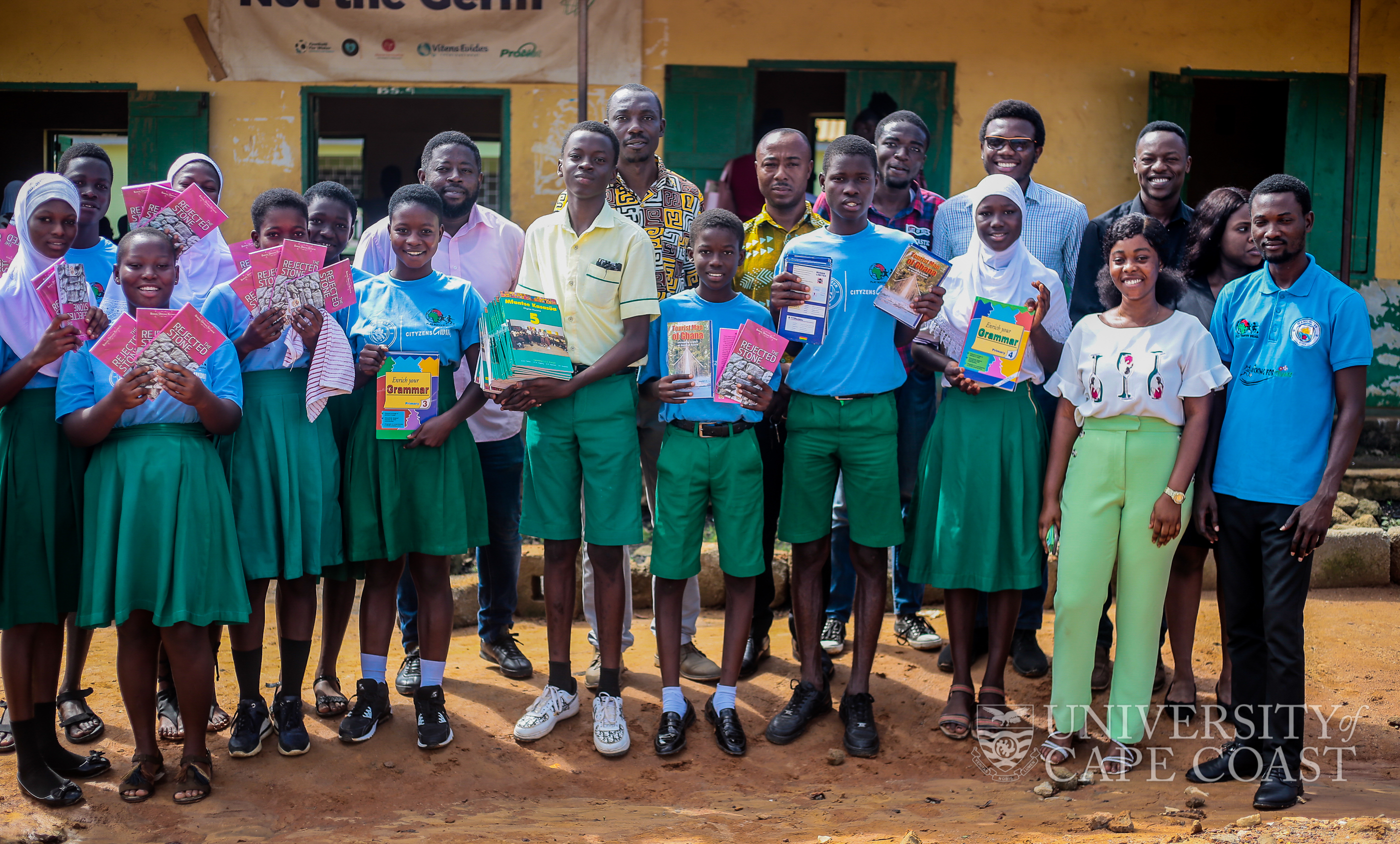Some pupils of the school with some of the donated books