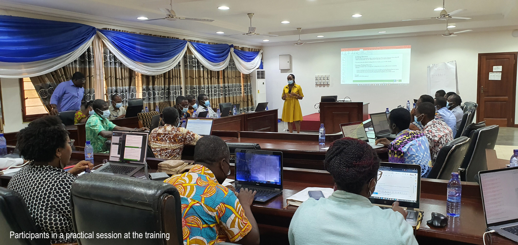 Participants in a practical session at the training