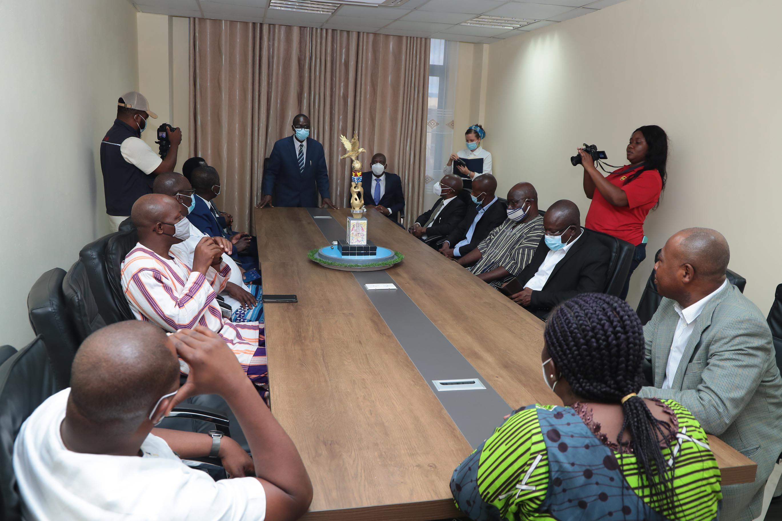 Representatives of WASCAL in a group photo with the Vice-Chancellor and Registrar.