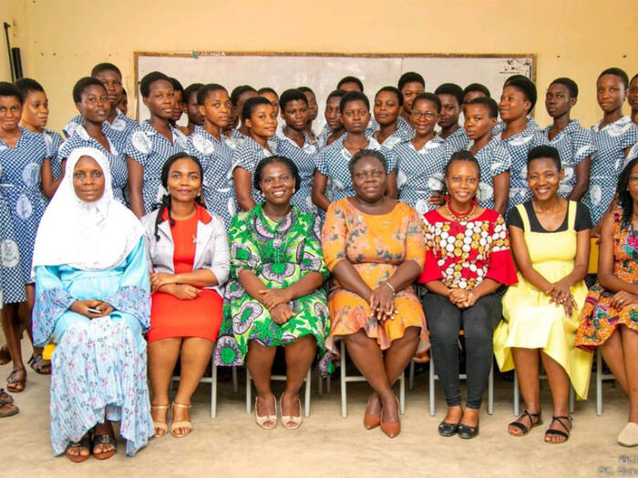 CEGRAD representatives with students of Academy of Christ the King Senior High School