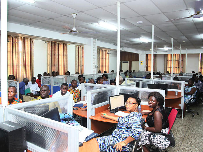 Some postgraduate students listening to presentations at the workshop