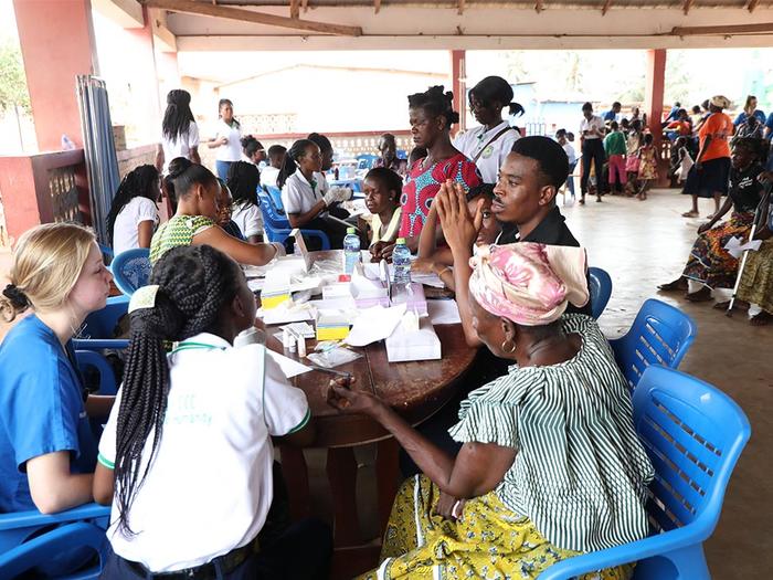 The NUSA and GVSU students screening people