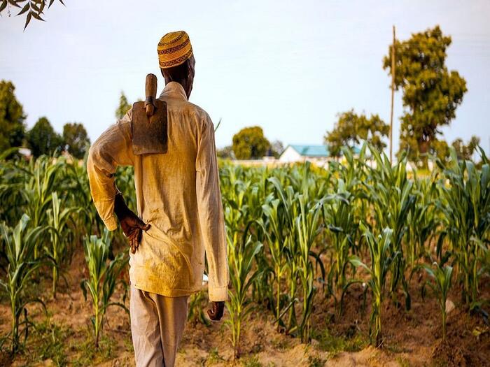 Small holder farmer on his way to the farm Small holder farmer on his way to the farm