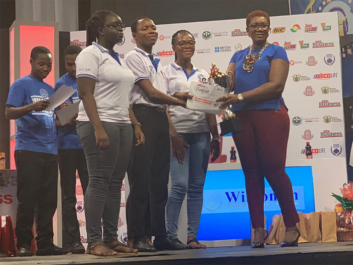 The UCC team receiving a prize from one of the sponsors The UCC contestants receiving their prize