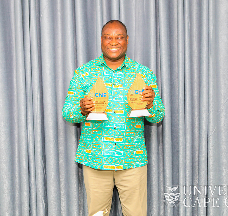 Prof. Tulashie with his awards Prof. Tulashie with his awards